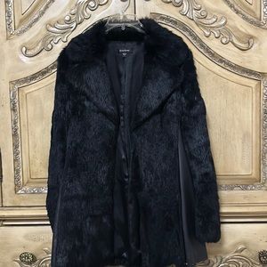 bebe jacket for with leather size small in excellent condition.